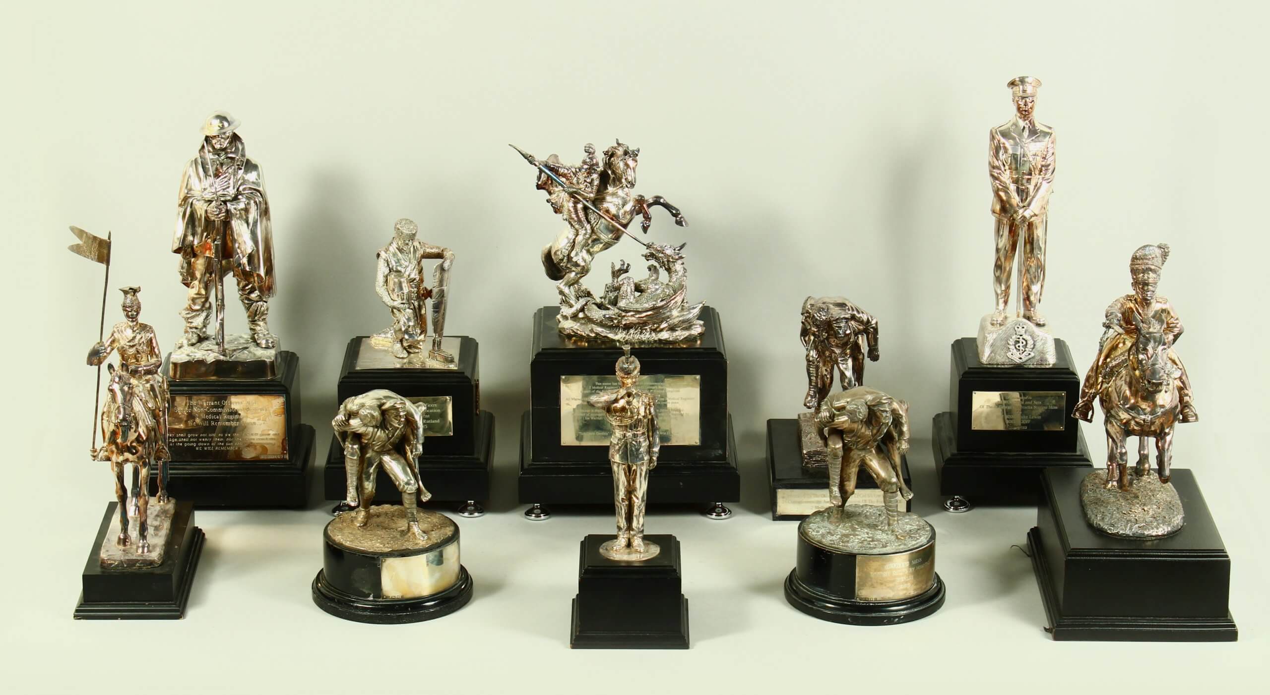 A collection of military trophies depicting military and historical figur