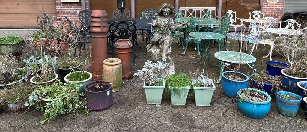 A selection of garden furniture and pots. Saturday antique and