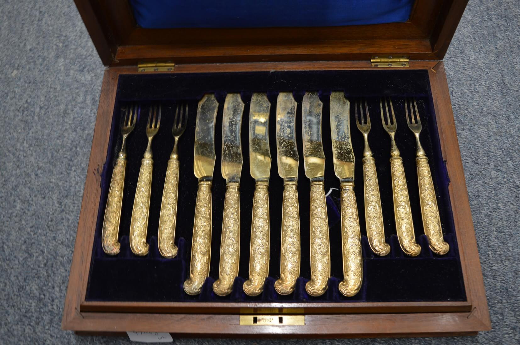 Mappin and Webb, a good cased set of twelve silver gilt dessert
