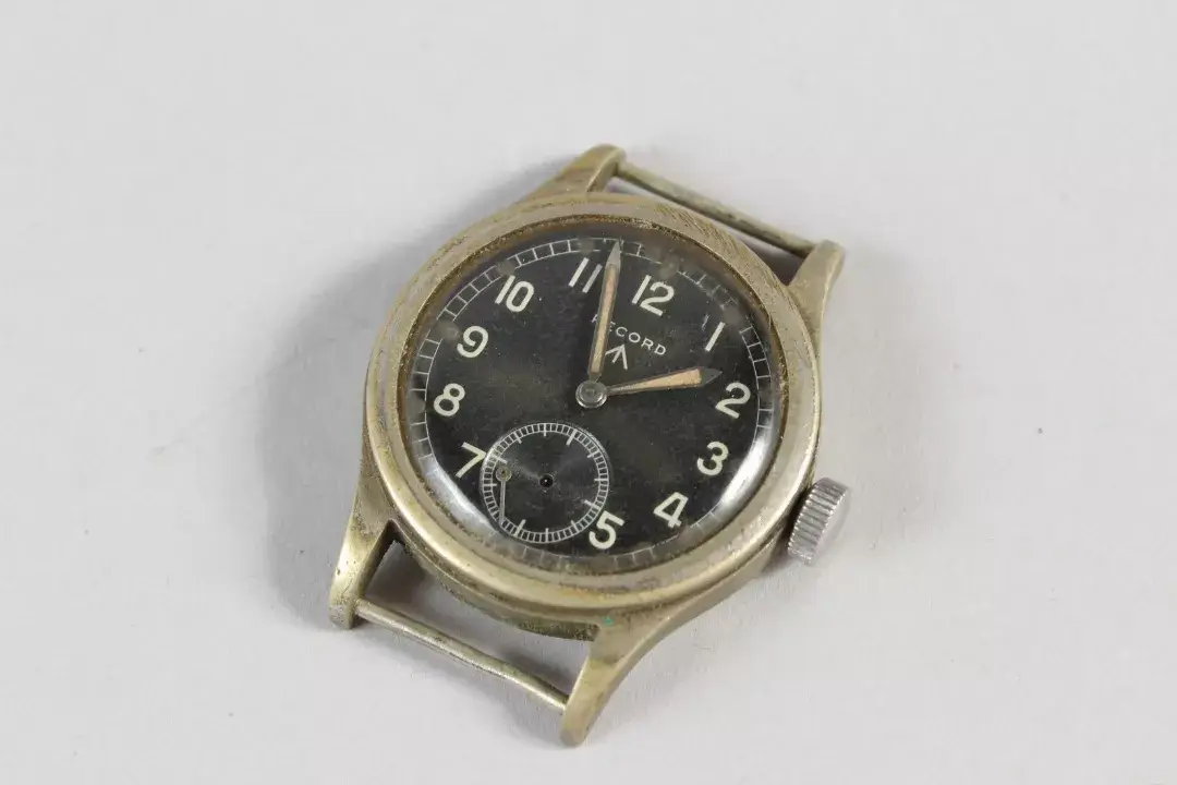 A Record WWW British Military watch, famously known as the Dirty dozen (no strap). No. L11921 529768. Fine
