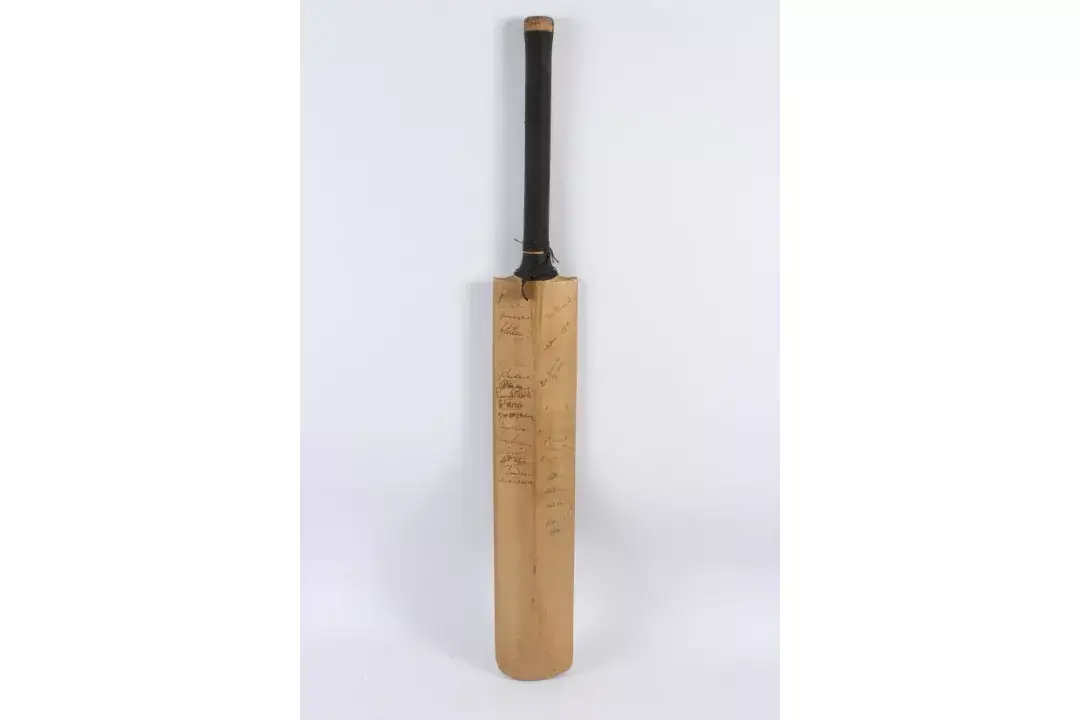 England and Surrey cricket bat with Australian signatures